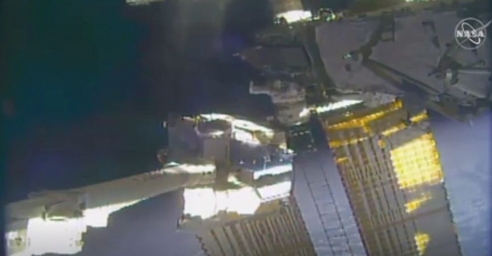 Spacewalking astronauts replace old space station batteries as part of years-long upgrade