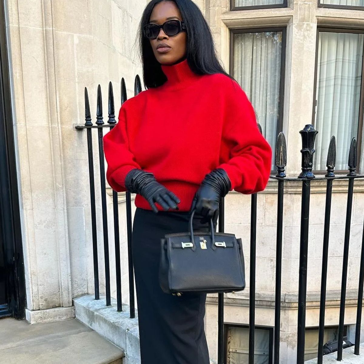 Marilyn NK wearing a red jumper