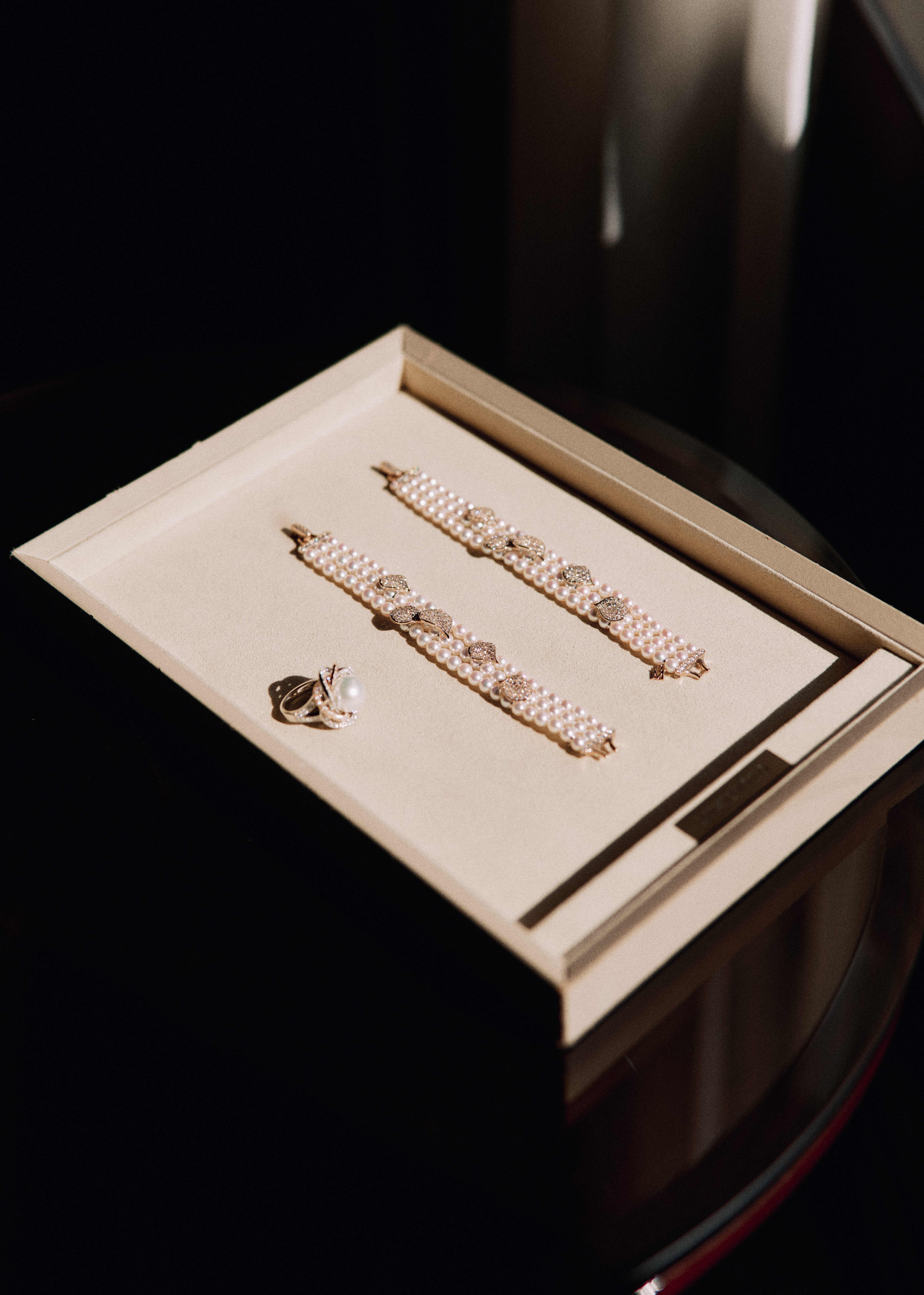 a close up of mikimoto pearl bracelets