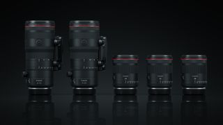 Five Canon hybrid RF lenses side by side on a dark background with their reflections.