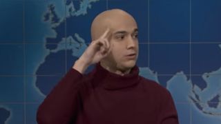 Andrew Dismukes wears a bald cap during an SNL Weekend Update segment.