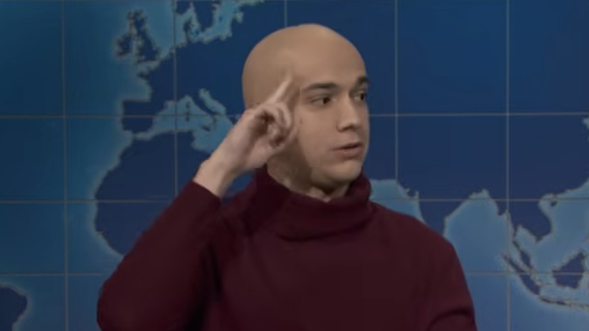 Andrew Dismukes wears a bald cap during an SNL Weekend Update segment.