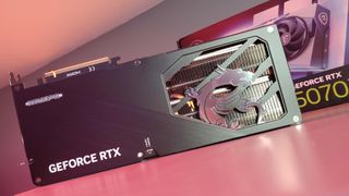 MSI RTX 5070 Ti Gaming Trio OC Plus graphics card under a red light