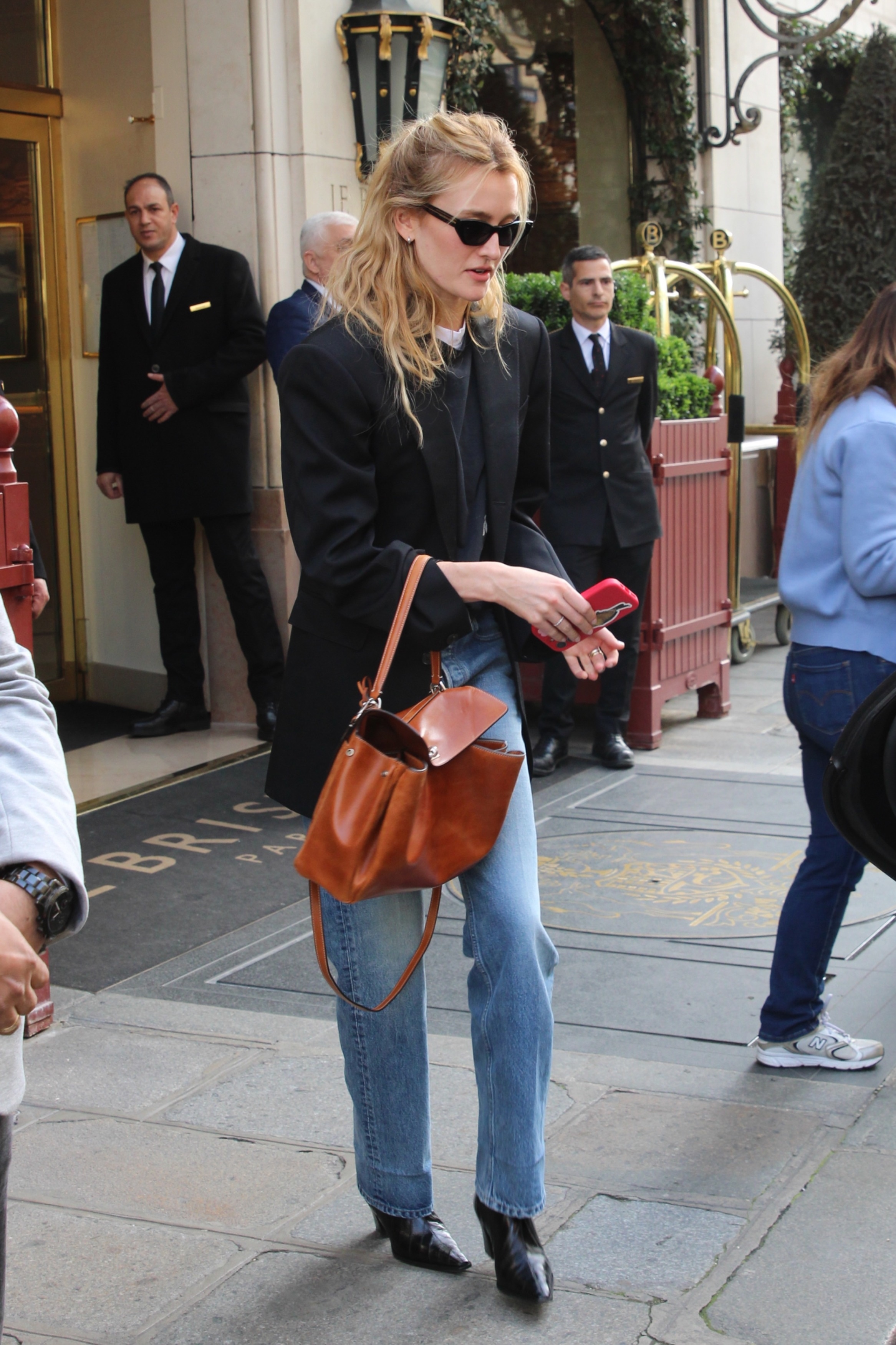 Sarah Pidgeon was spotted in Paris Fashion Week carrying a brown Balenciaga Rodeo bag