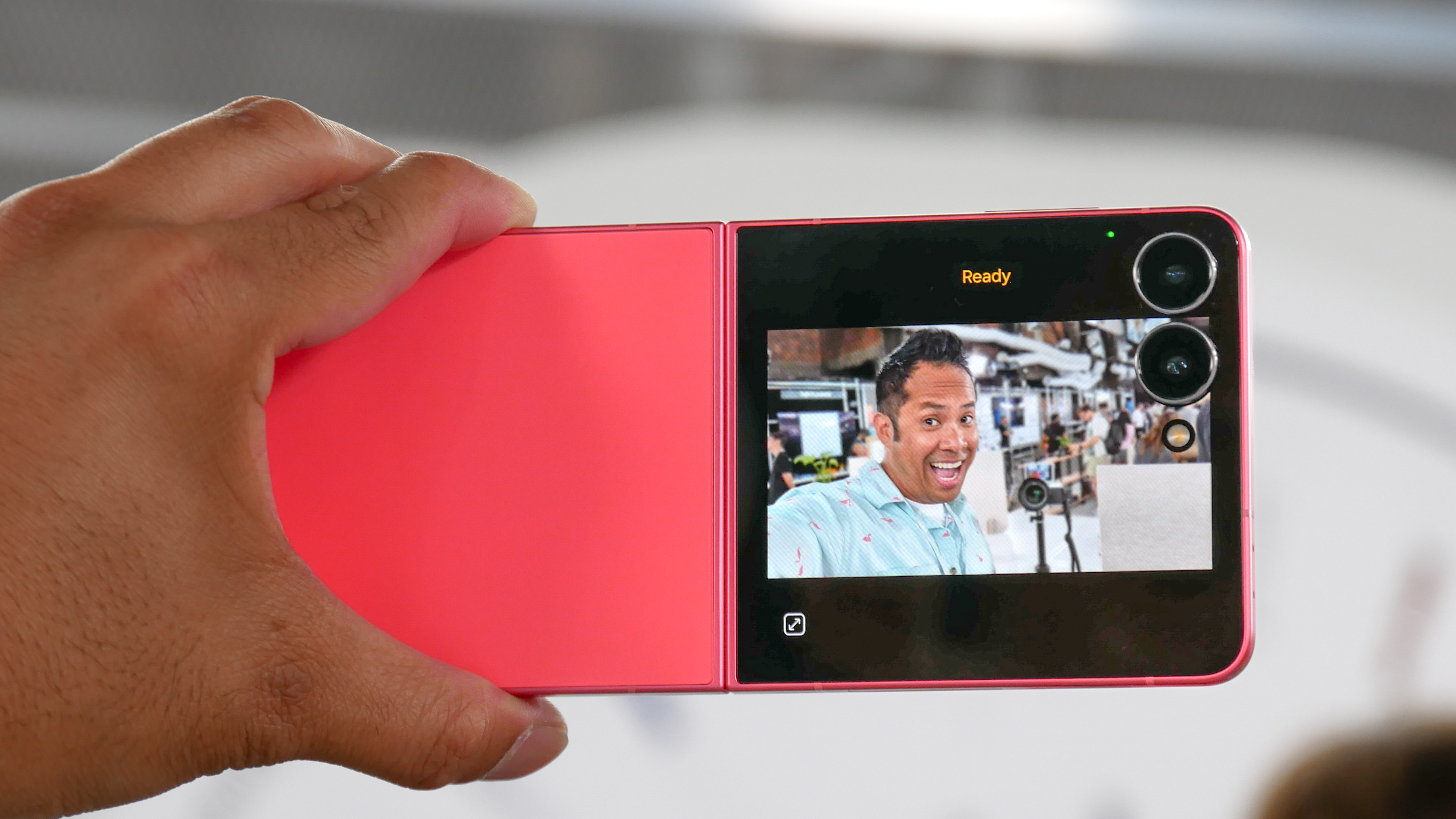 Samsung Galaxy Z Flip 7 held in the hand.