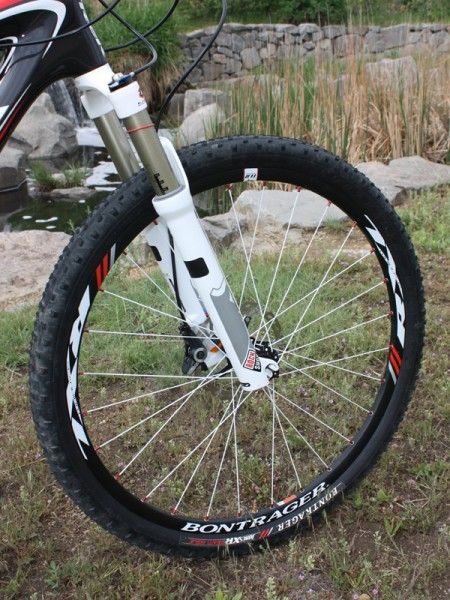 The lightweight rolling stock includes scandium rims and narrow tires that spin up remarkably quickly.