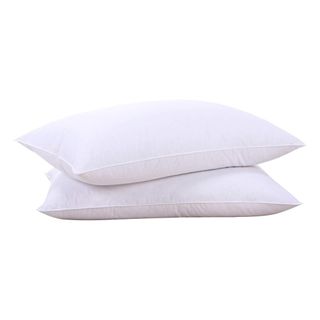 Two white pillows stacked on top of each other
