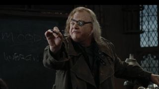 Mad Eye Moody teaches the students at Hogwarts.