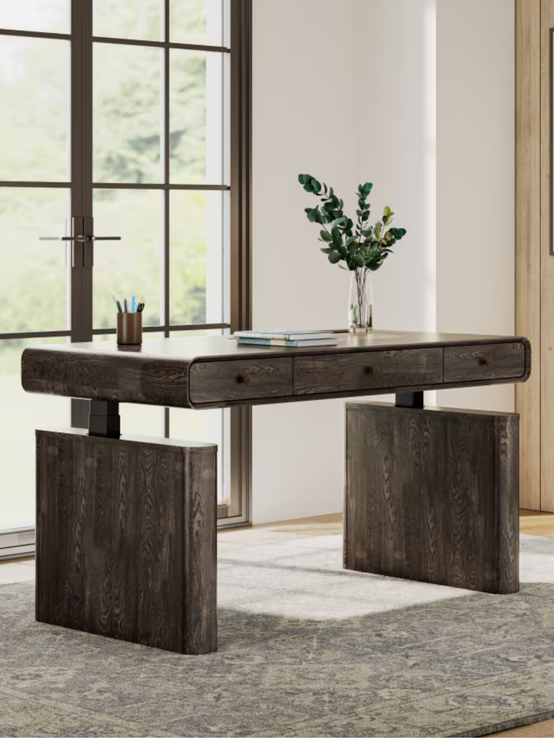 A dark wood standing desk with storage from FlexiSpot