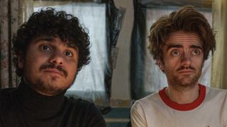 Kash (Bilal Hasna) and his mysterious new flatmate (Luke Rollason) look bemused in Extraordinary.