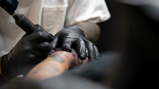Close up of someone getting tattooed