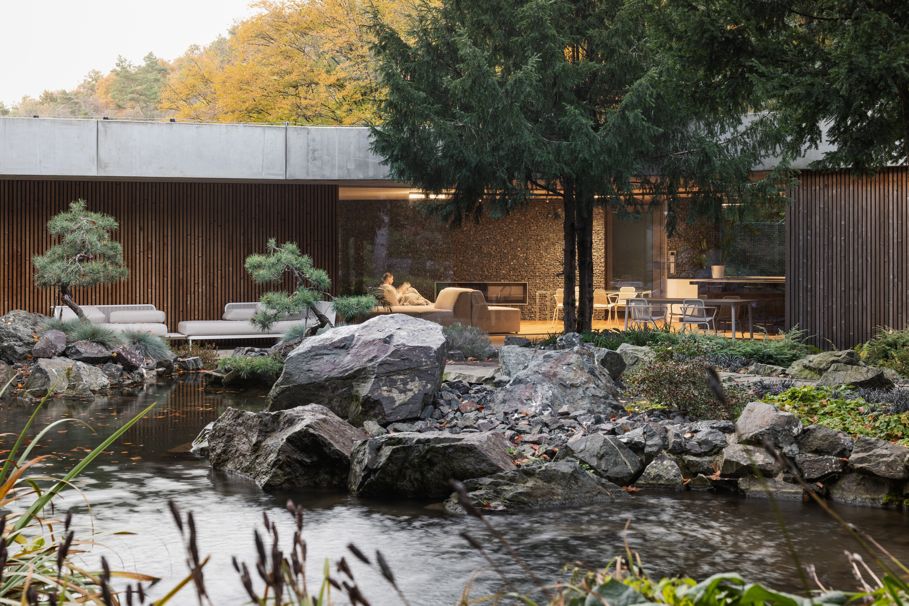 A rock garden and pool forms a focal point of the landscaping