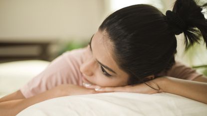 Woman lying in bed