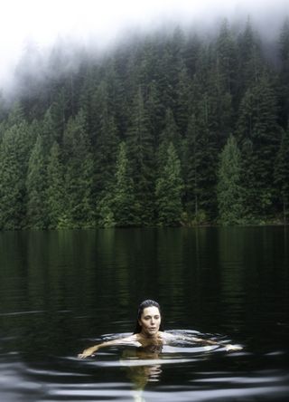 Woman wild swimming