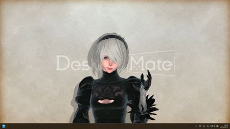Nier Automata's 2B smiles into the camera while standing in front of a plain cream screen and the Desktop Mate logo.