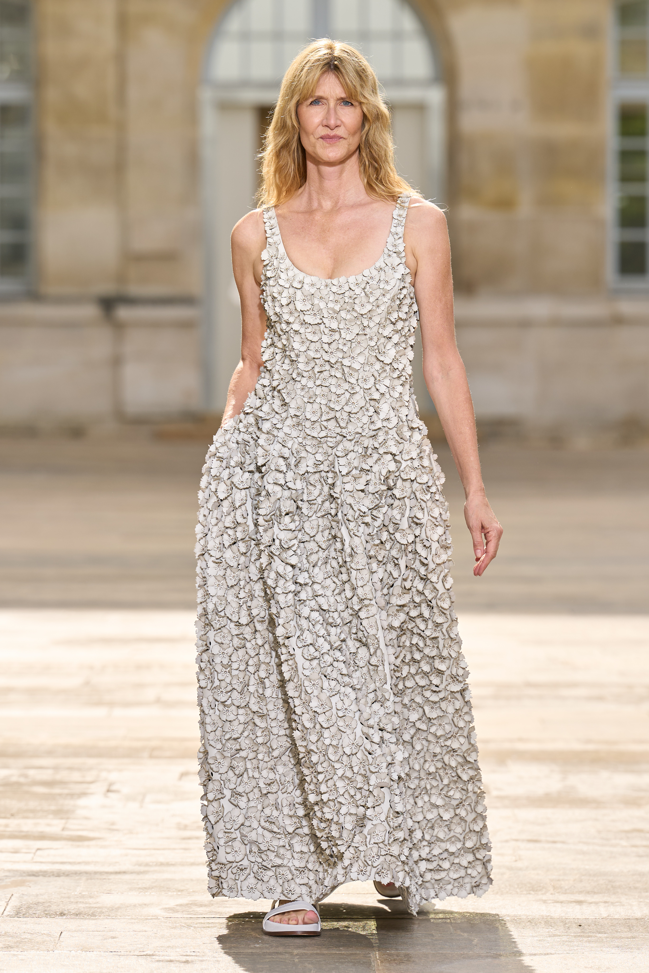 laura dern wears a textured dress for gabriela hearst ss26 show