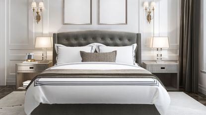 Beautiful white and neutral bedroom with bed face on
