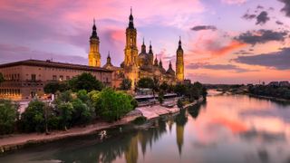 Zaragoza cathedral and Ebro river at sunset
