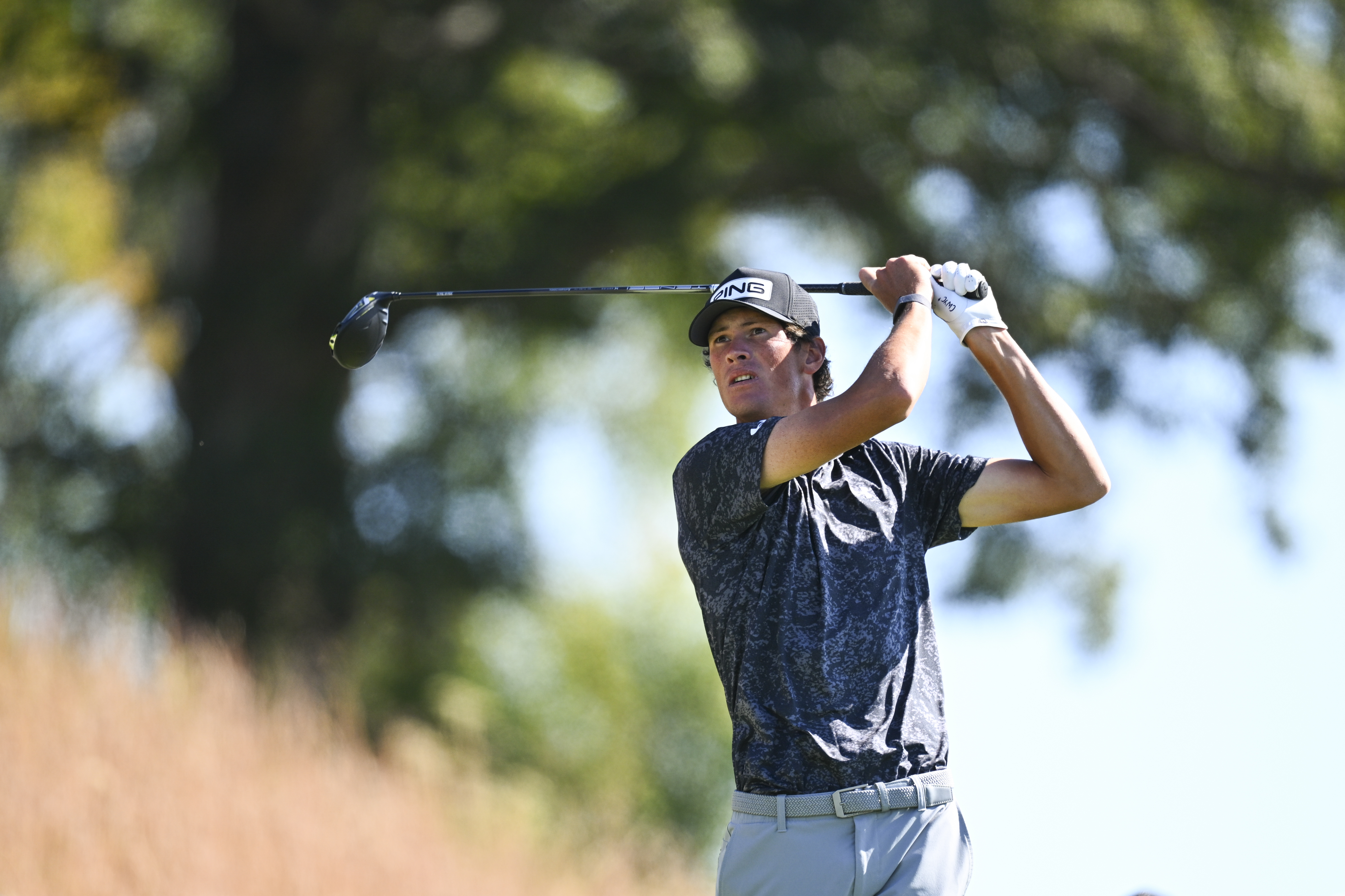 Christo Lamprecht holds his finish on a drive