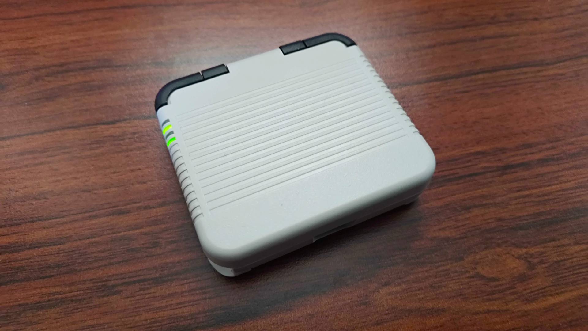 Back view of Gamesir Pocket Taco on desk.