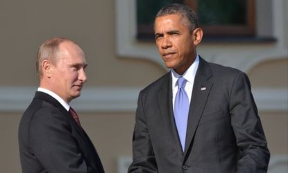 Russian President Vladimir Putin greets President Barack Obama at the G20 summit on September 5, 2013 in St. Petersburg, Russia.