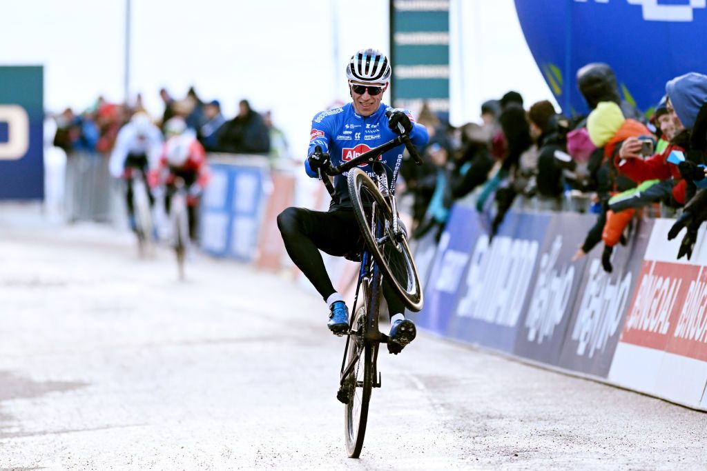 VERMIGLIO ITALY DECEMBER 17 Niels Vandeputte of Belgium and Team AlpecinDeceuninck crosses the finish line on second place during the 2nd UCI Cyclocross World Cup Val Di Sole 2022 Mens Elite CXWorldCup on December 17 2022 in Vermiglio Italy Photo by Dario BelingheriGetty Images