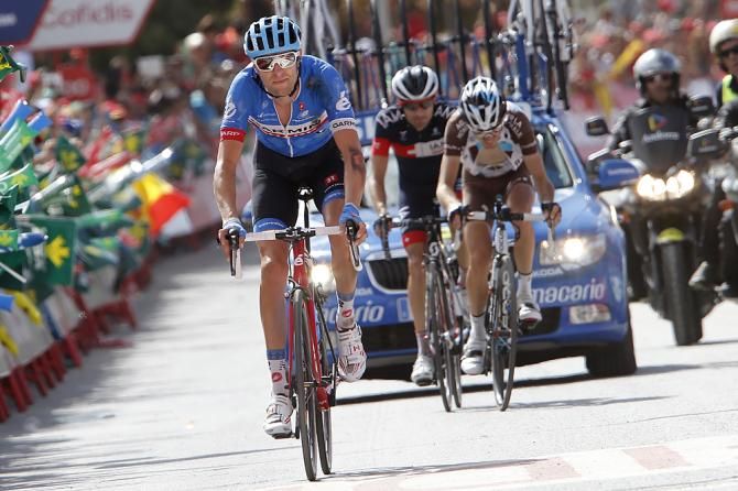 Ryder Hesjedal (Garmin-Sharp) crosses the finish line in second place