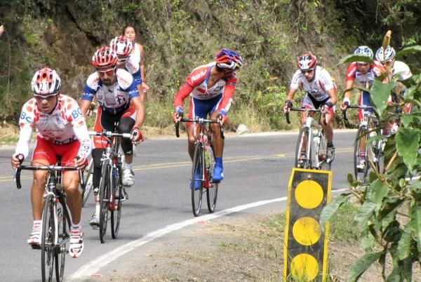 A rider checks behind to see who is following the move during stage 10.