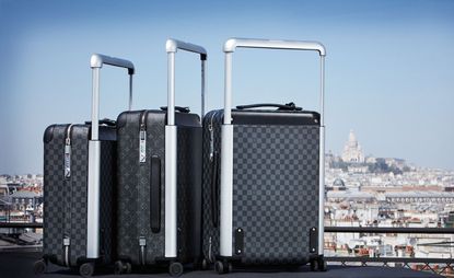 rolling luggage trunks 