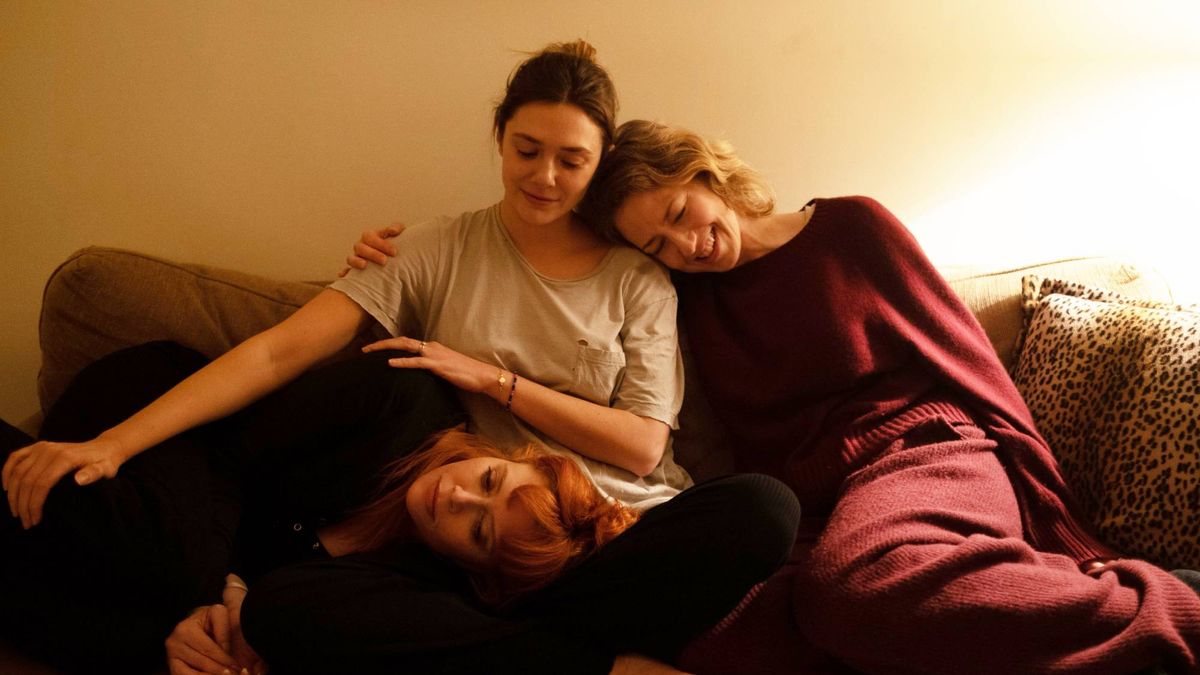 (L-R) Natasha Lyonne as Rachel, Elizabeth Olsen as Christina and Carrie Coon as Katie in &quot;His Three Daughters&quot; streaming on Netflix in September 2024