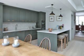 modern grey galley kitchen ideas with seating area