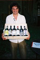 Mario Cristiani with the bottles