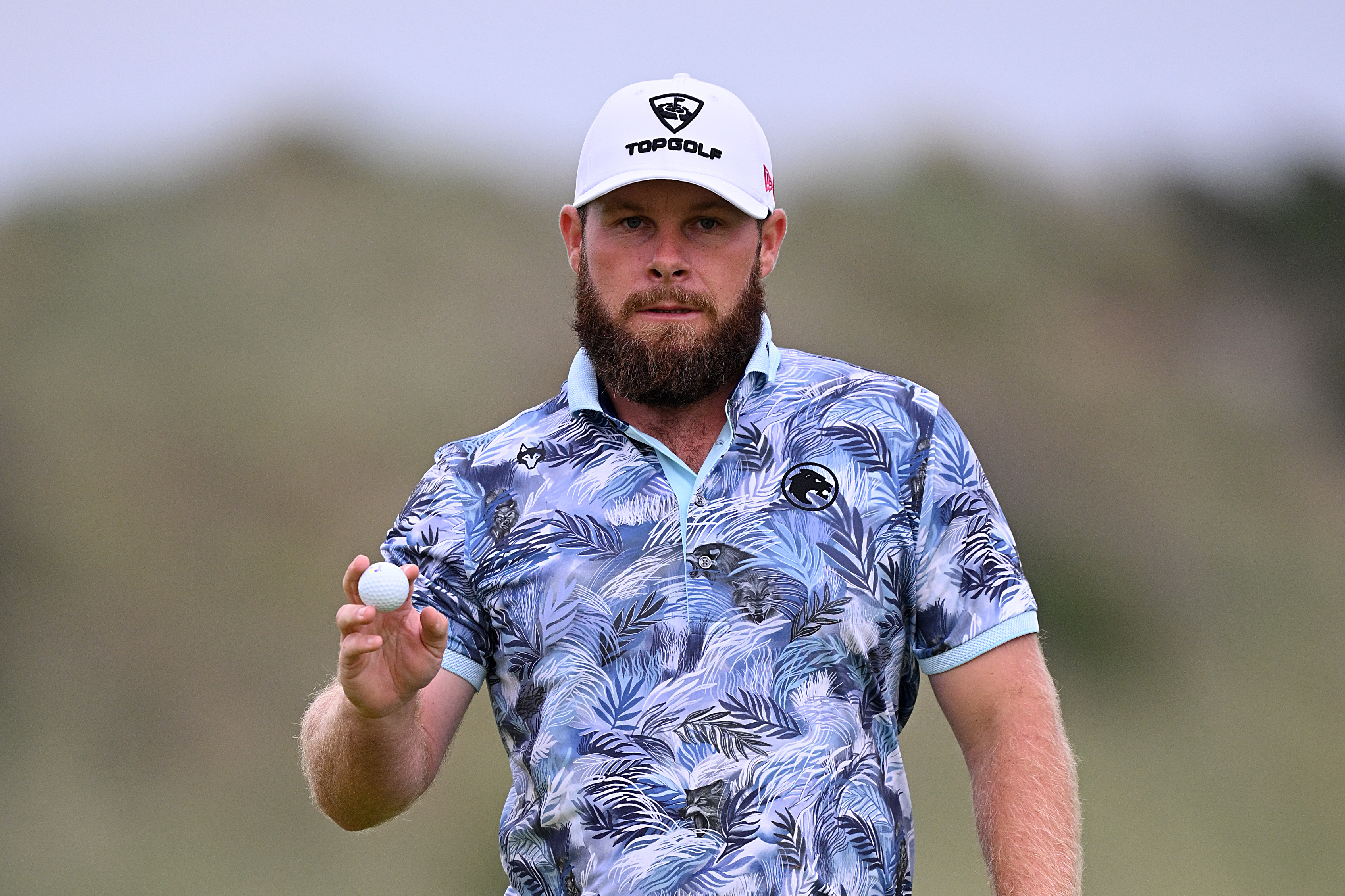 Tyrrell Hatton waves to the crowd