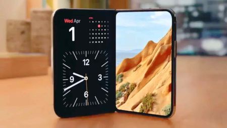 The iPhone Duo standing on a surface showing StandBy mode