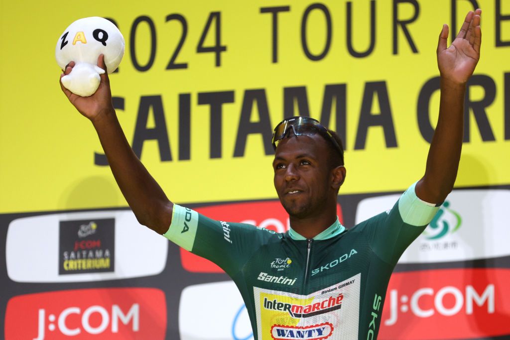 SAITAMA JAPAN NOVEMBER 02 Hailu Biniam Girmay of Eritrea and Team Intermarche Wanty Green Sprint Jersey celebrates at podium as race winner during the 10th Tour de France Saitama Criterium 2024 Criterium Race a 612km one day race from Saitama to Saitama on November 02 2024 in Saitama Japan Photo by Rhode Van ElsenGetty Images