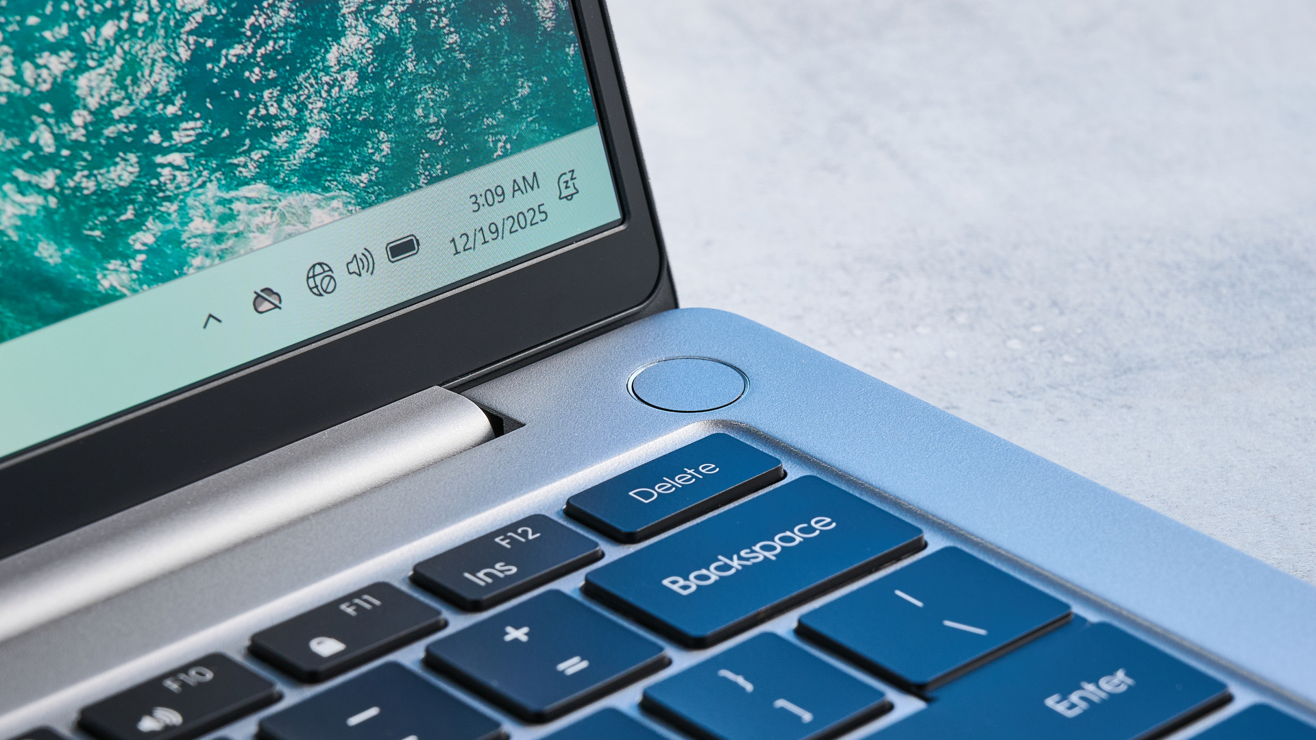 A silver Geekom GeekBook X14 Pro Windows laptop