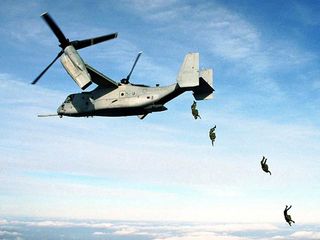 Paratroopers deploy from a V-22 Osprey.