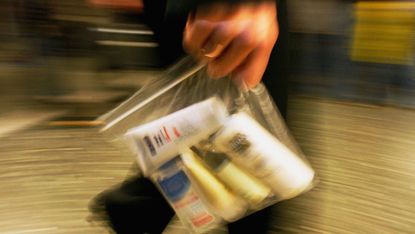 Liquid containers go through airport security