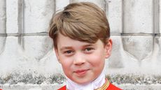 Prince George could be set for a special overseas trip. Seen here he watches an RAF flypast