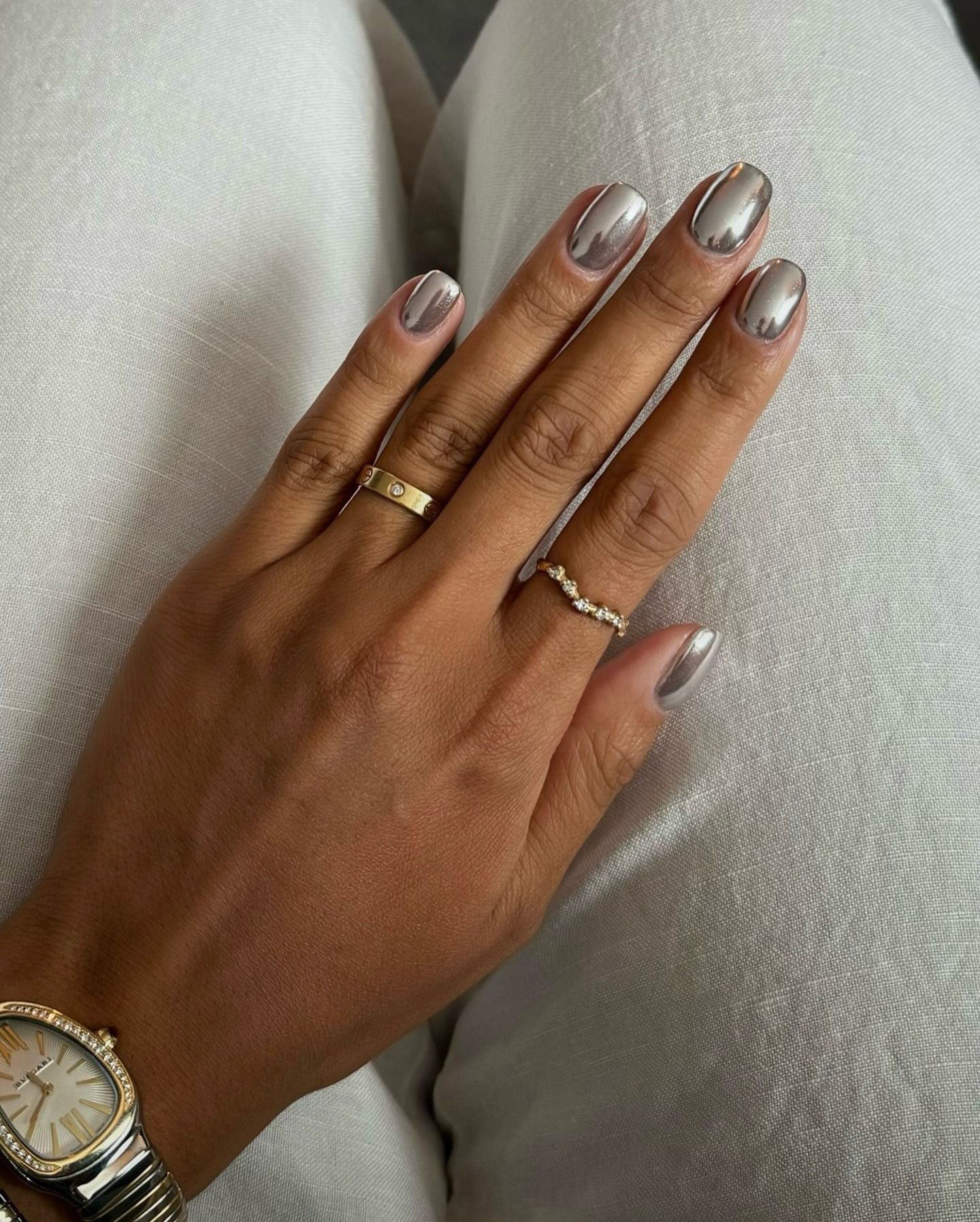 Chrome silver nails.