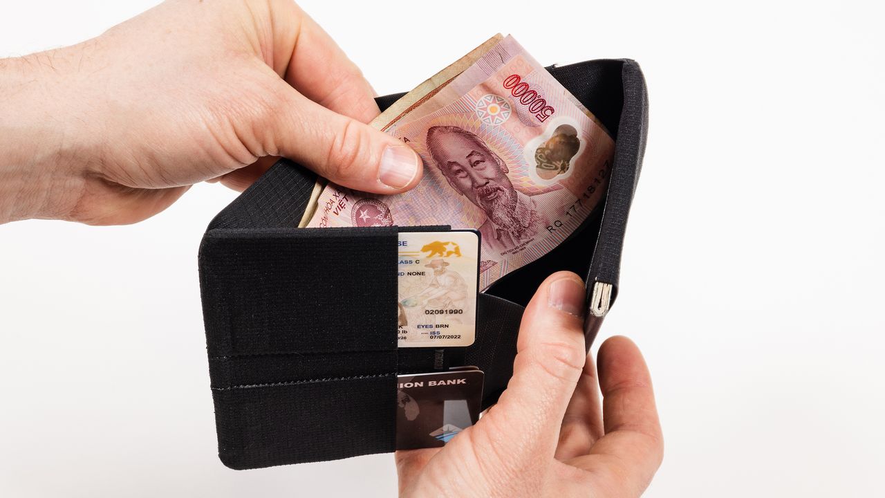 A photo of the Peak Design Passport Wallet on a white background