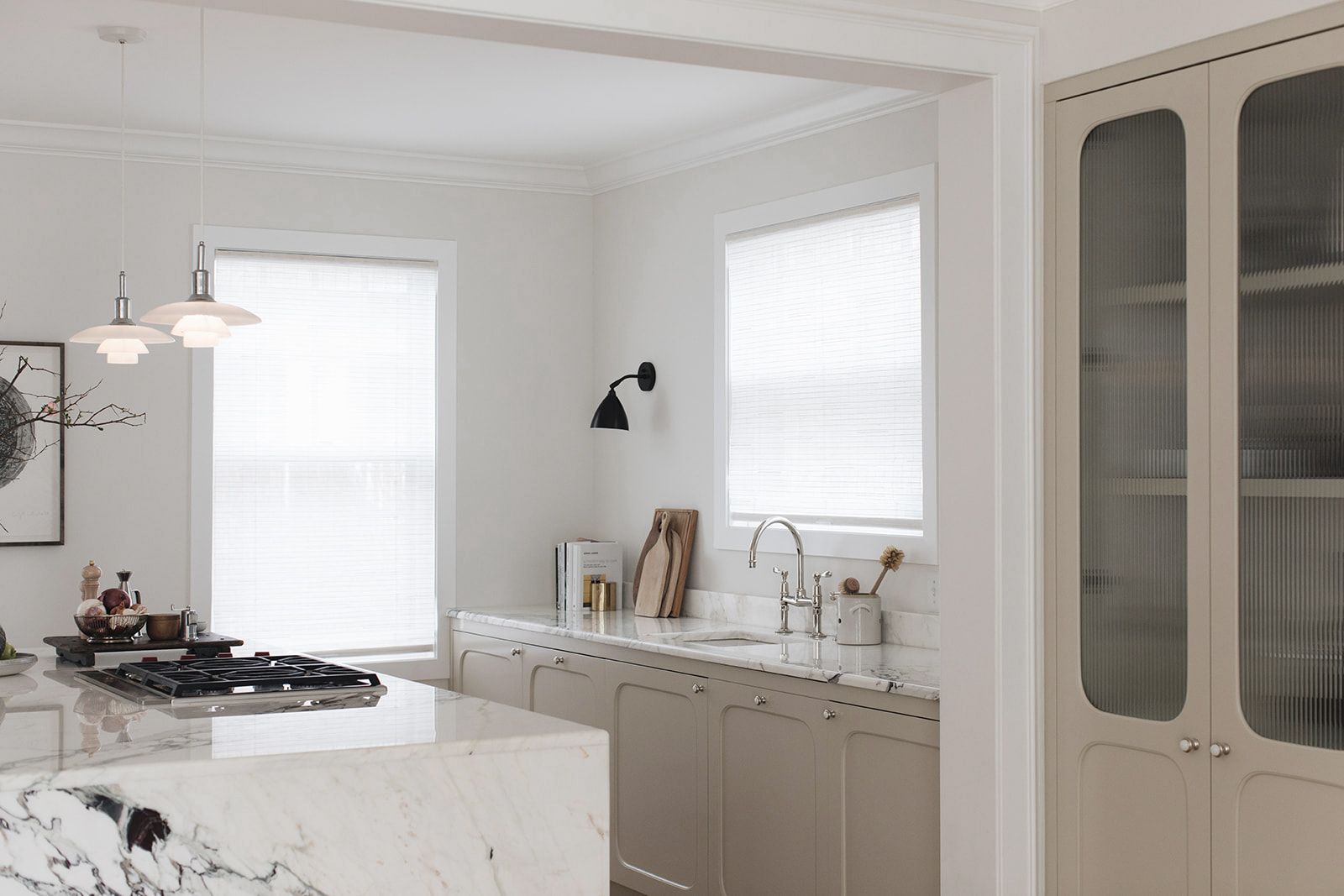 modern kitchen idea with curved cabinets