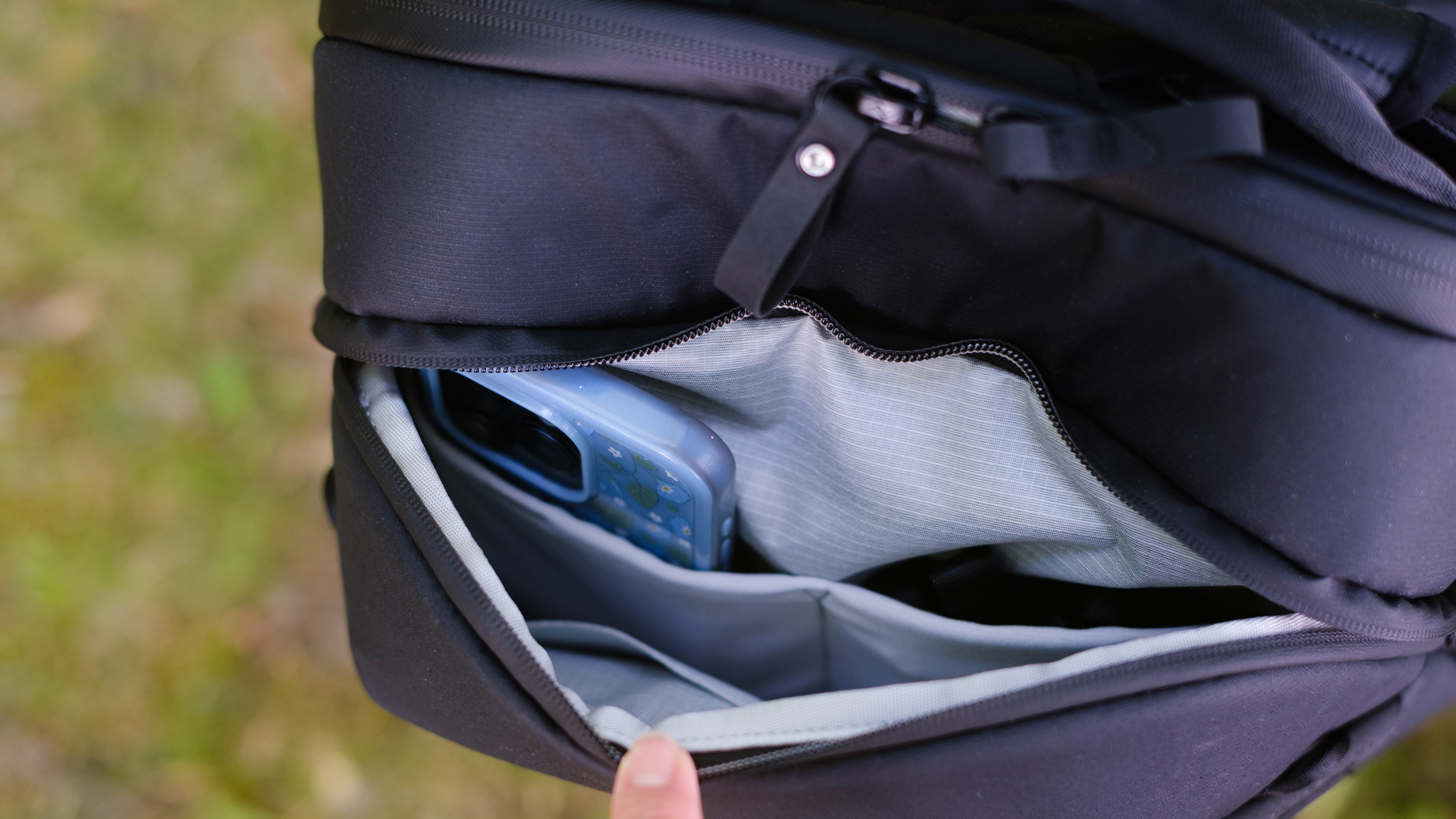The Peak Design Travel Backpack 20L in use by a photographer