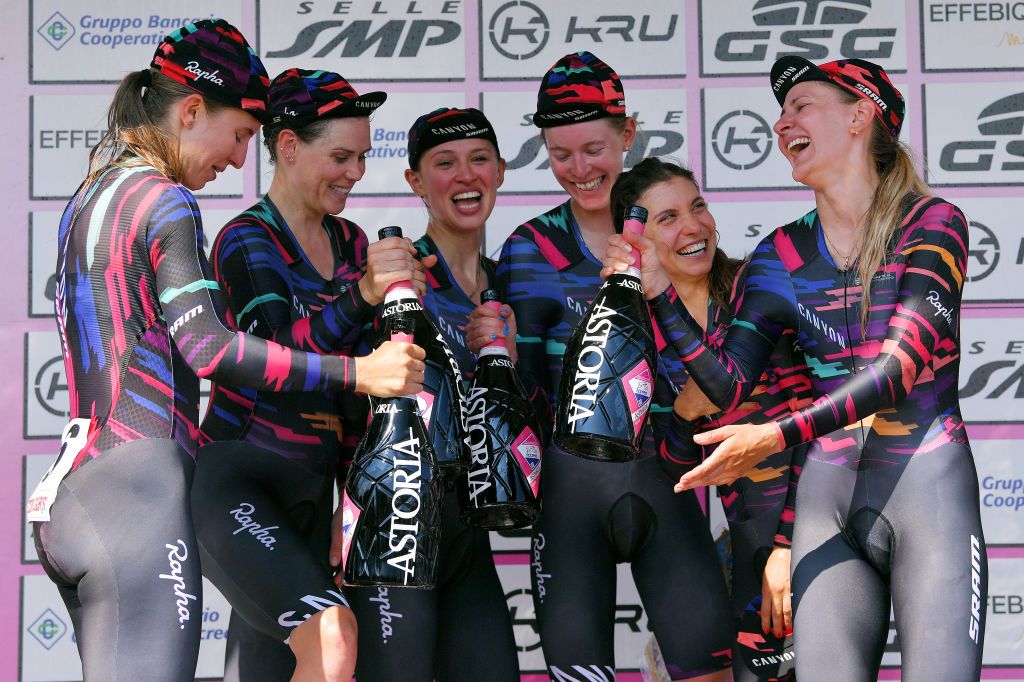 CASTELLANIA ITALY JULY 05 Podium Alena Amialiusik of Belarus and Canyon SRAM Racing Team Hannah Barnes of United Kingdom and Canyon SRAM Racing Team Tiffany Cromwell of Australia and Canyon SRAM Racing Team Omer Shapira of Israel and Canyon SRAM Racing Team Katarzyna Niewiadoma of Poland and Canyon SRAM Racing Team Alexis Ryan of The United States and Canyon SRAM Racing Team Celebration Champagne during the 30th Tour of Italy 2019 Women Stage 1 a 18km Team Time Trial from Cassano Spinola to Castellania 380m TTT Giro Rosa GiroRosa Girodonne on July 05 2019 in Castellania Italy Photo by Luc ClaessenGetty Images