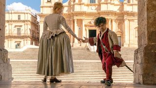 Haley Bennett as Roxanne and Peter Dinklage as Cyrano de Bergerac in Cyrano on Prime Video