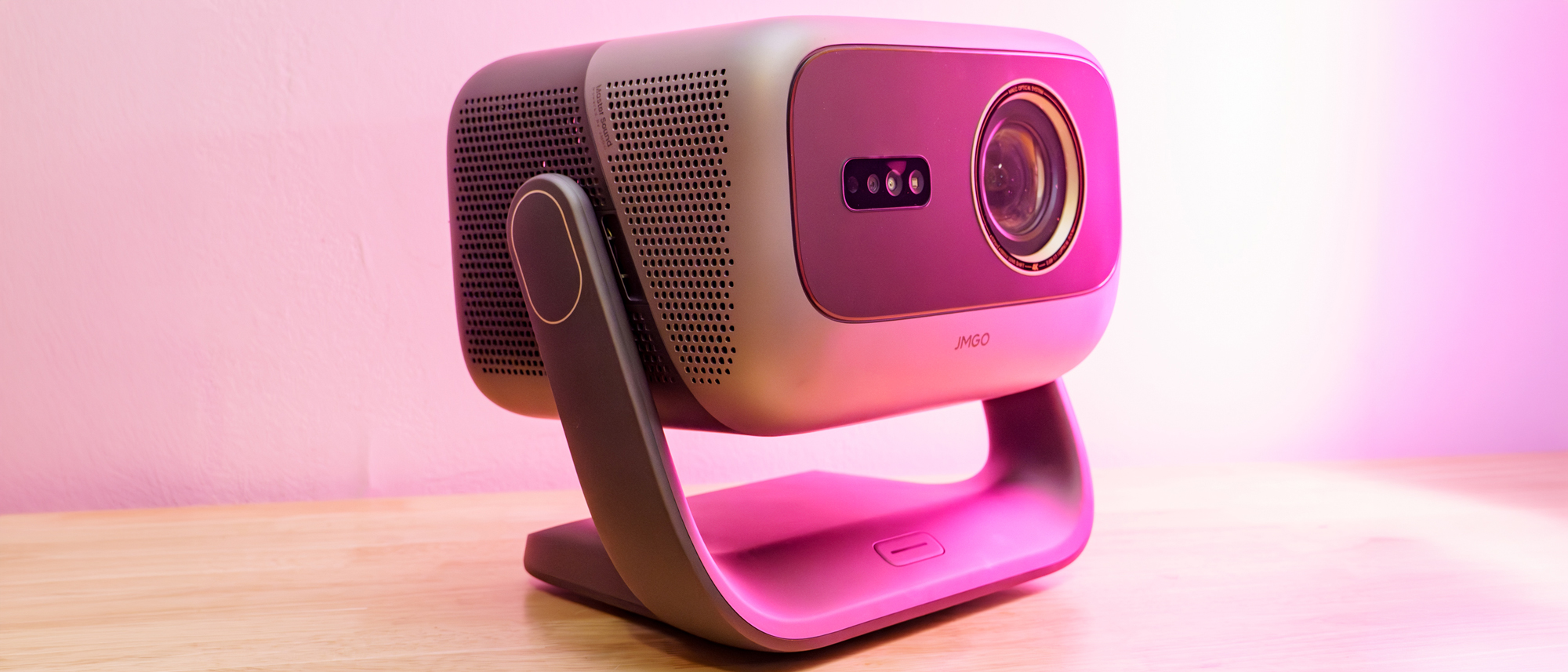 A JMGO N3 Ultimate projector on a desk