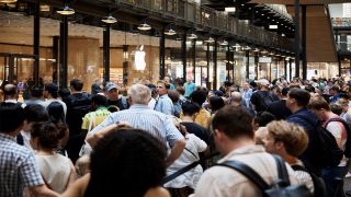 Crowds lining up around an Apple store