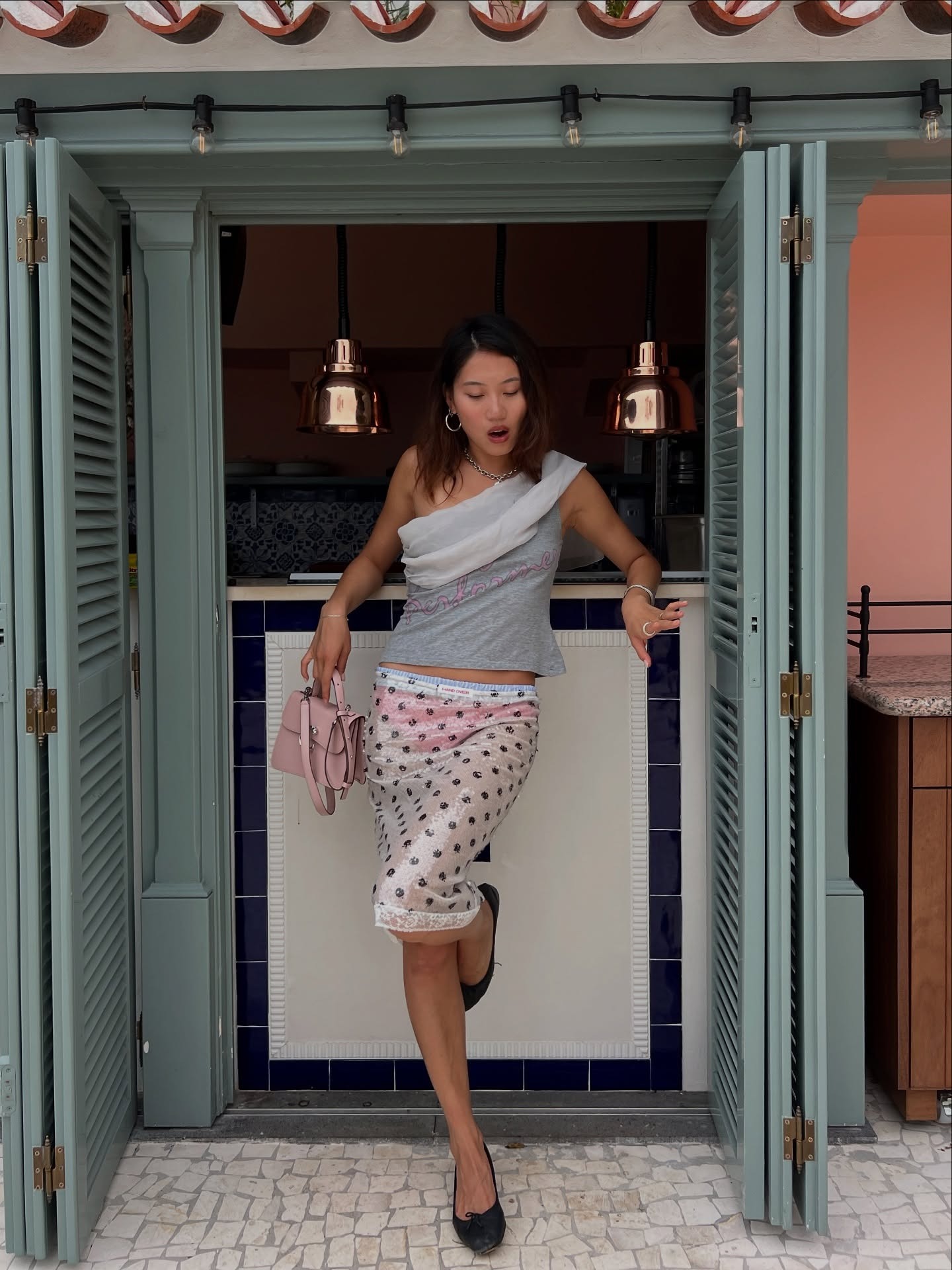 Vivian Li wearing sheer skirt