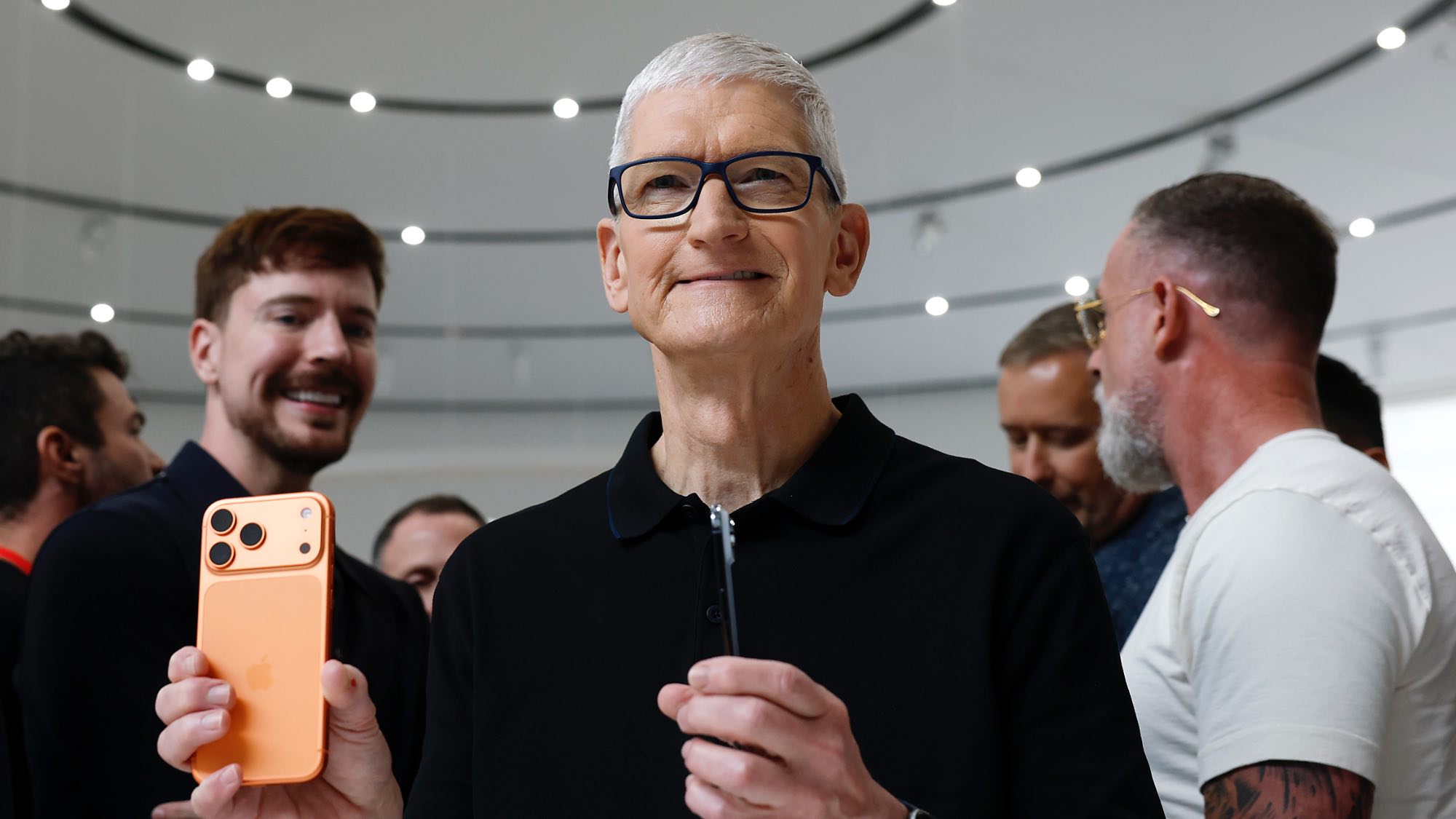 Tim Cook holding iPhone 17 Pro