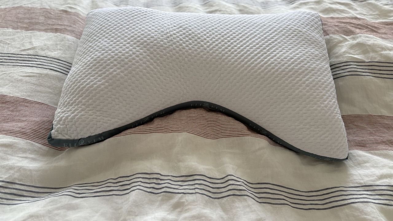 Testing the Eli &amp; Elm Ultimate Side Sleeper Pillow, showing it on the bed